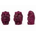 Owl hand-carved from natural ruby, 55 carats, shown from three angles with feather detail