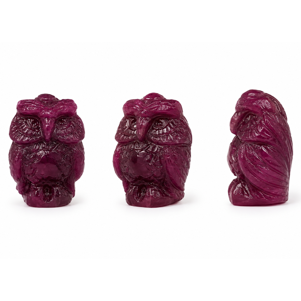 Owl hand-carved from natural ruby, 55 carats, shown from three angles with feather detail