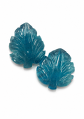 Matched pair of leaves hand-carved from natural aquamarine, 62.59 carats total, with relief vein detail