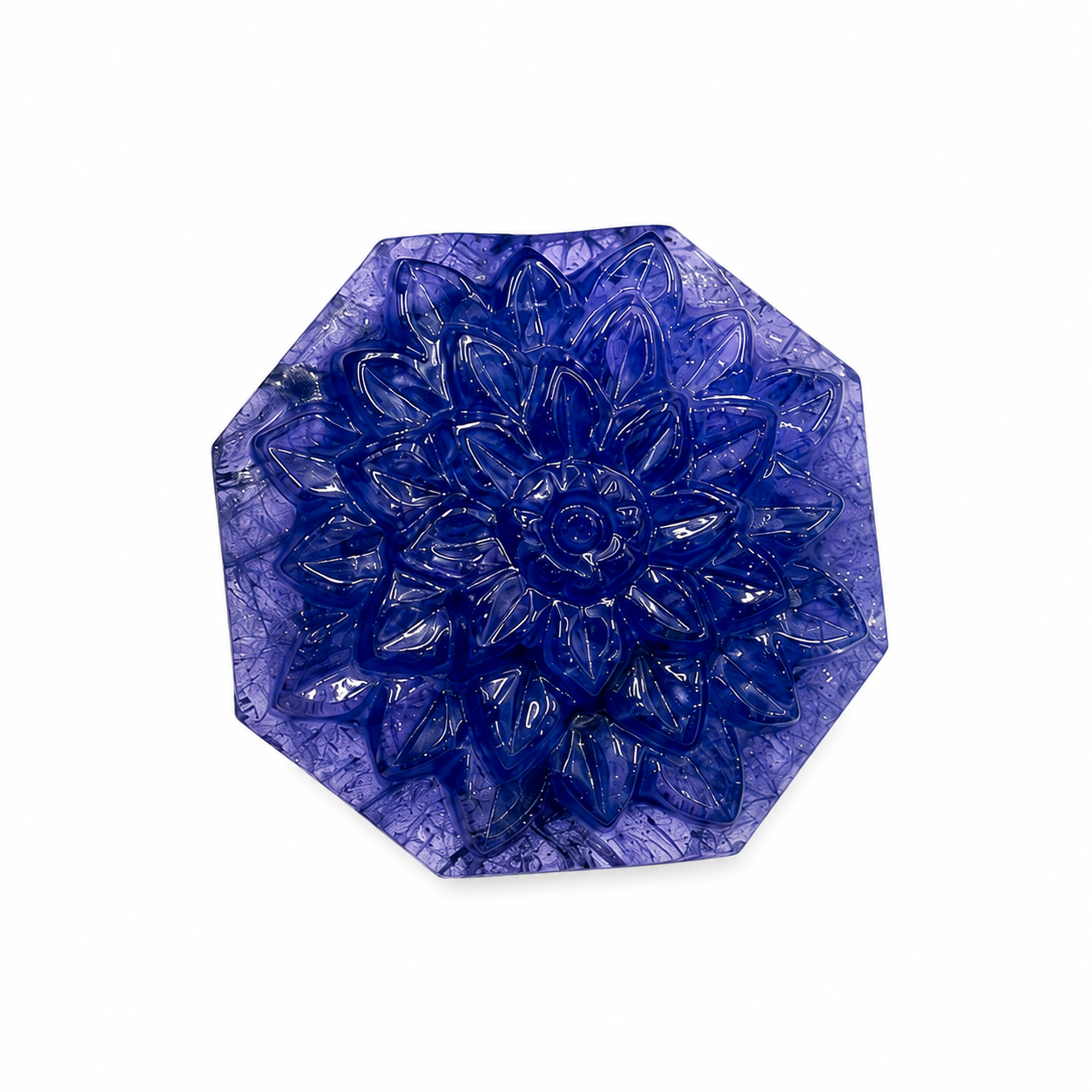 Octagonal natural tanzanite carved with a concentric lotus in relief, 102 carats